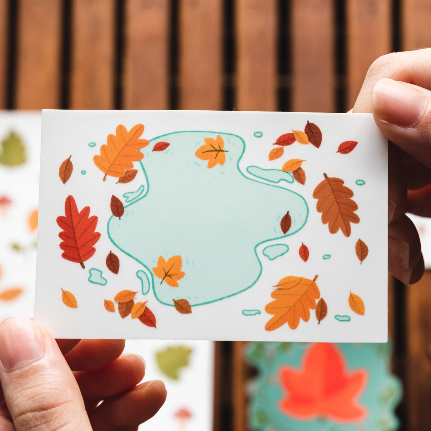 Autumn Puddle Vinyl Sticker by Cassandra Tan