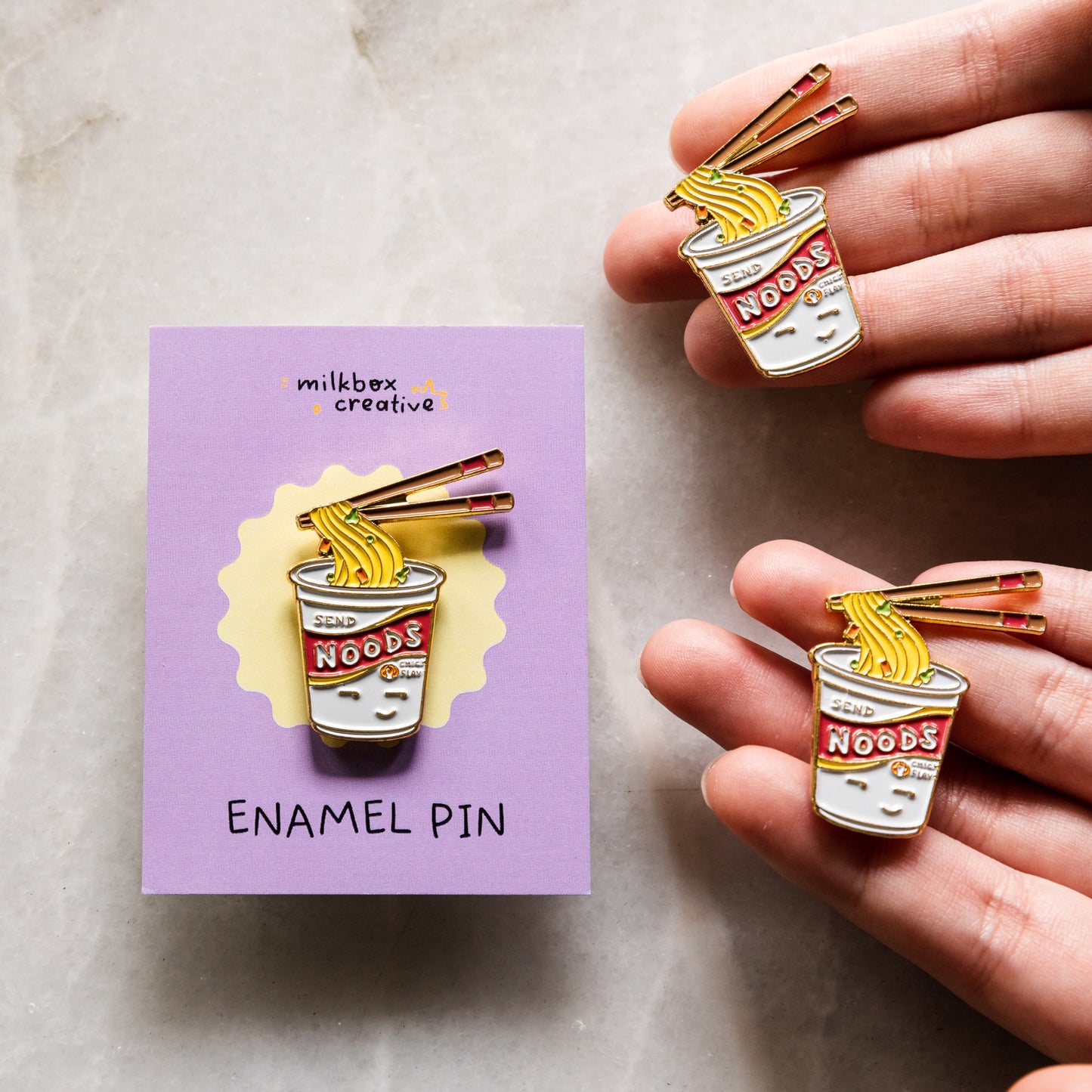 Send Noods Enamel Pin by Cassandra Tan