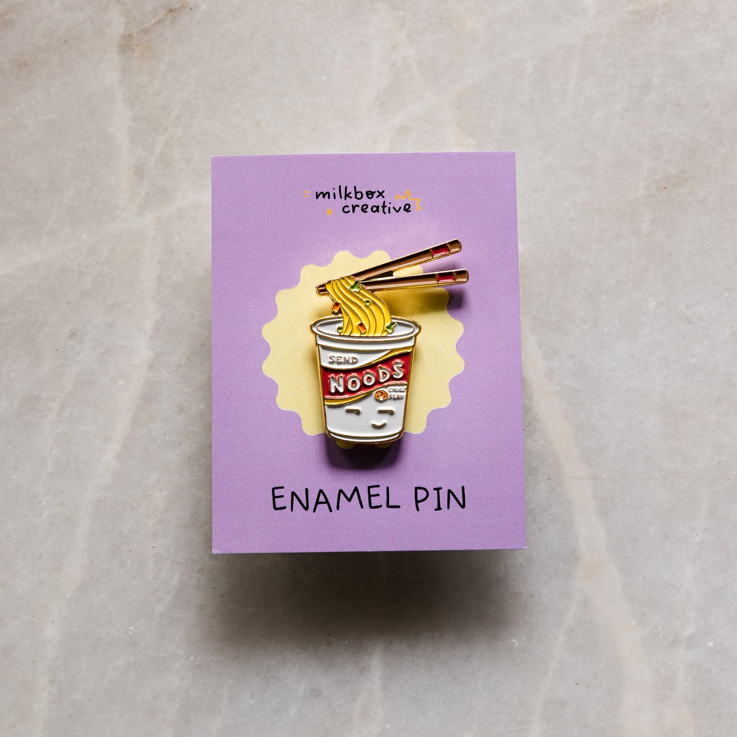 Send Noods Enamel Pin by Cassandra Tan